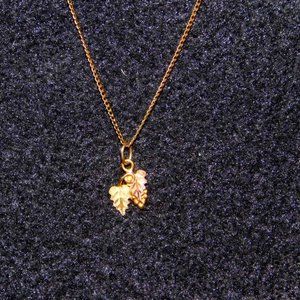 Black Hills Gold 10K double leaf grape necklace